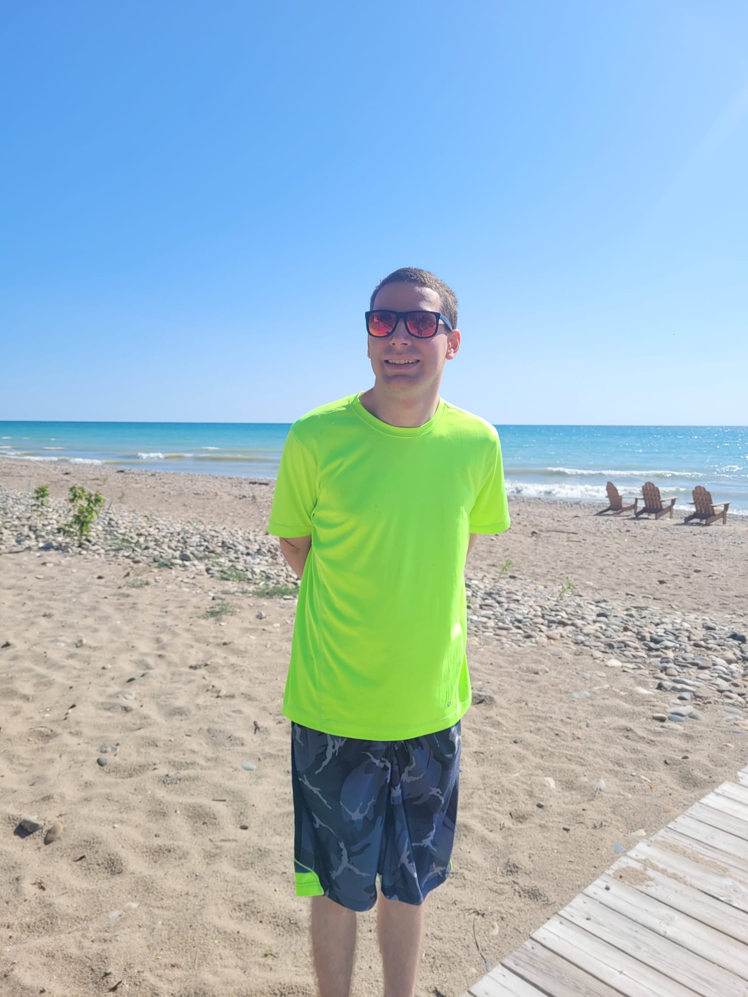 Camper enjoying the Lake Huron beach front.